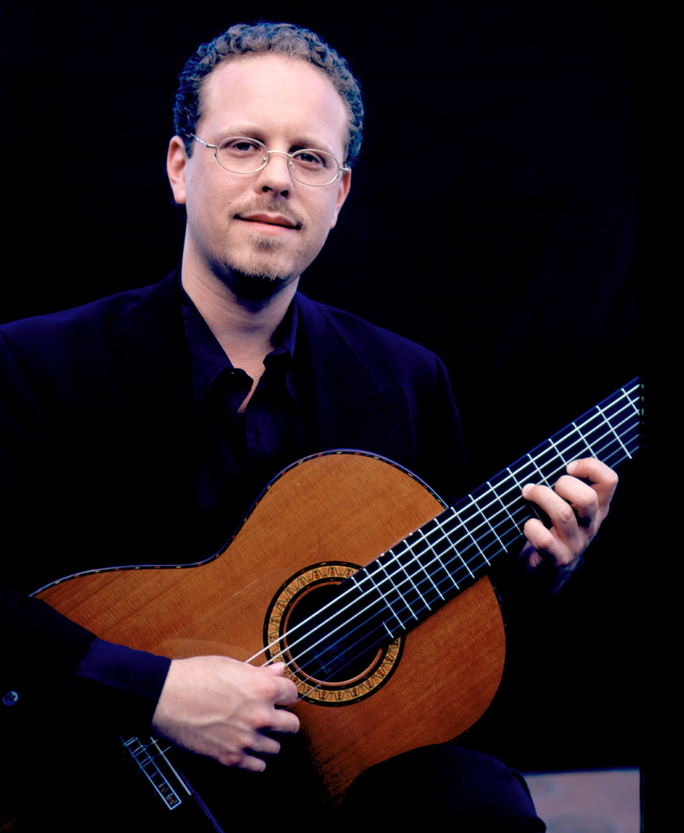 A headshot of solo guitarist Jordan Charnofsky