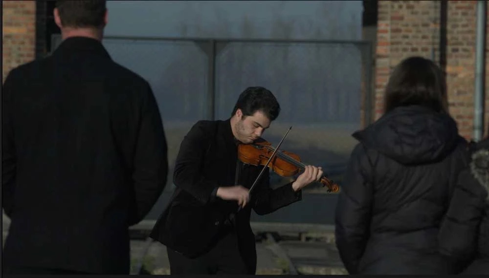 Erik Ghukasyan plays Shony's violin at Auschwitz.